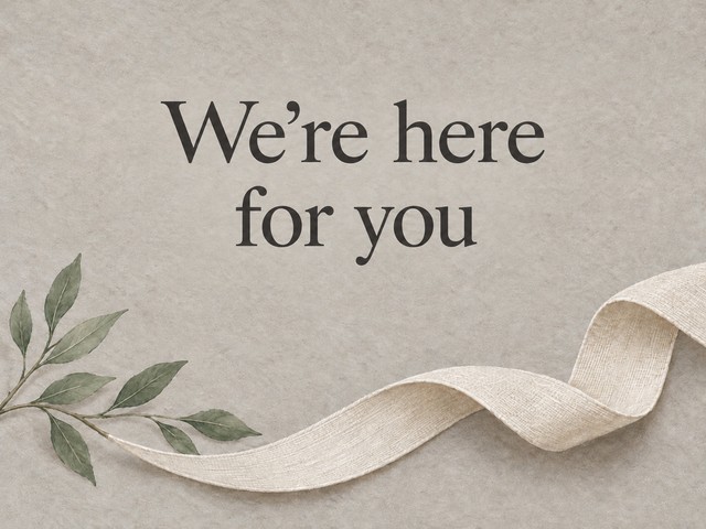 Illustration of an ivory linen ribbon and a branch on gray, with the message “We’re here for you”