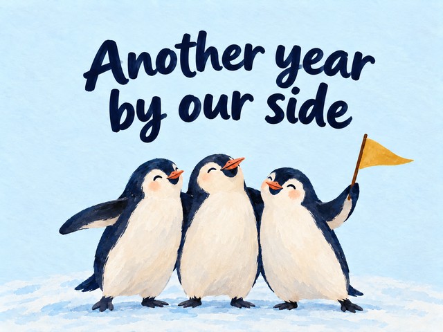 Illustration of three penguins and a yellow pennant on pale blue, with the message “Another year by our side”